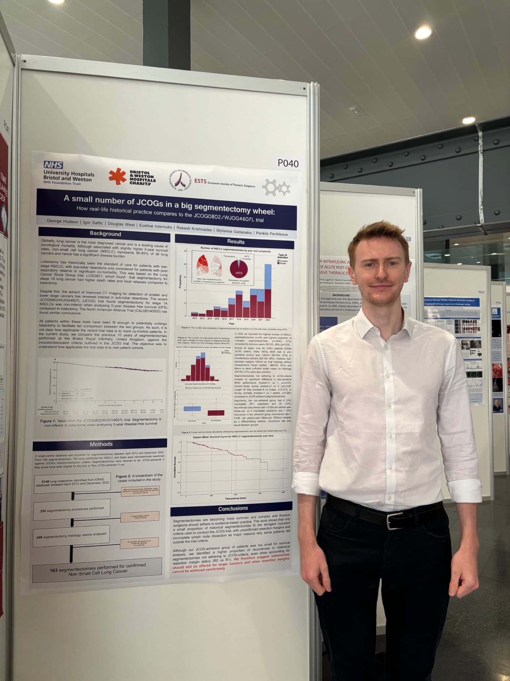 George Hudson beside his research poster